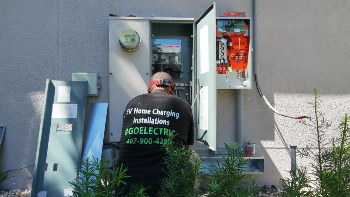 Installer working on a Central Florida Tesla Powershare project